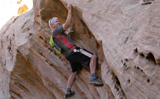 Mike Climbing on Rocks